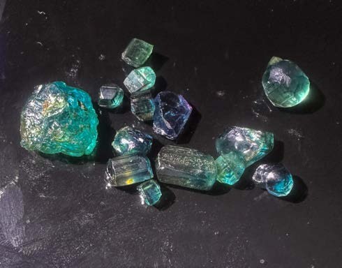 Credit to Mr. Ararsa (CEO - Qolansa Mining and Trading Plc) for allowing us to take videos and pictures of their gemstones and evaluate them. (Photo: Haimanot Sisay)
